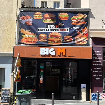 pose enseigne lumineuse magasin facade commerciale installation professionnelle Big M